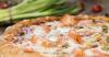 Recette de pizza saumon-poireaux au thermomix©