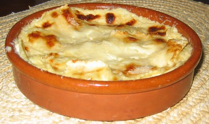 Recette de gratin de raviolis frais à la crème d'ail