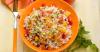 Recette de salade de riz coquine aux tomates, poivrons et amandes
