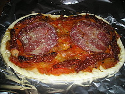 Recette de tarte à la coppa, tomates séchées et parmesan