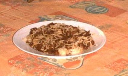 Recette de spaghettis en fondue d'oignons